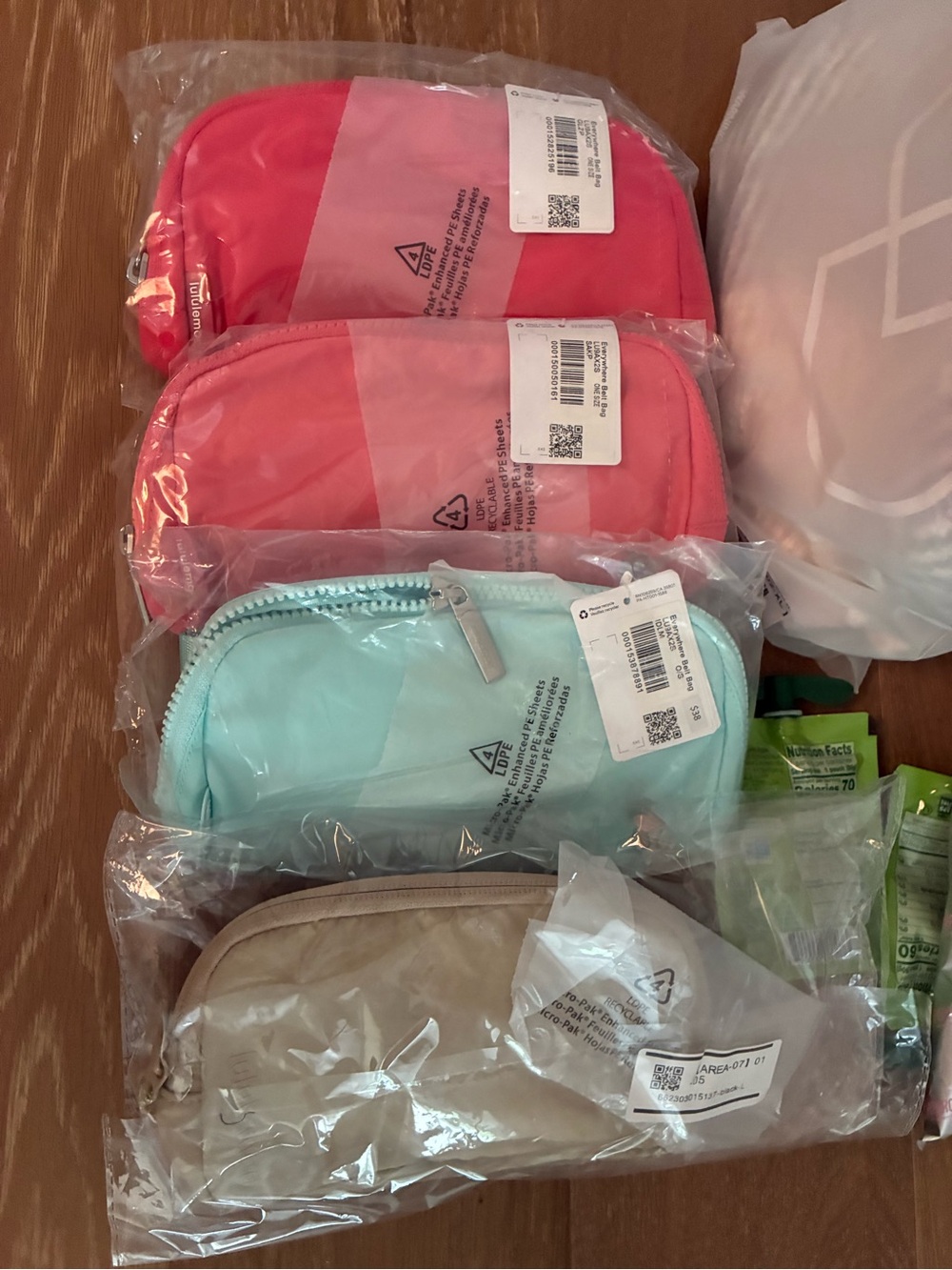 lululemon athletica Zip Pouch Set in Pink, Coral, Mint & Beige